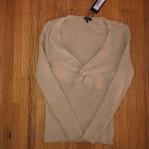 Sand colored knit top with knot